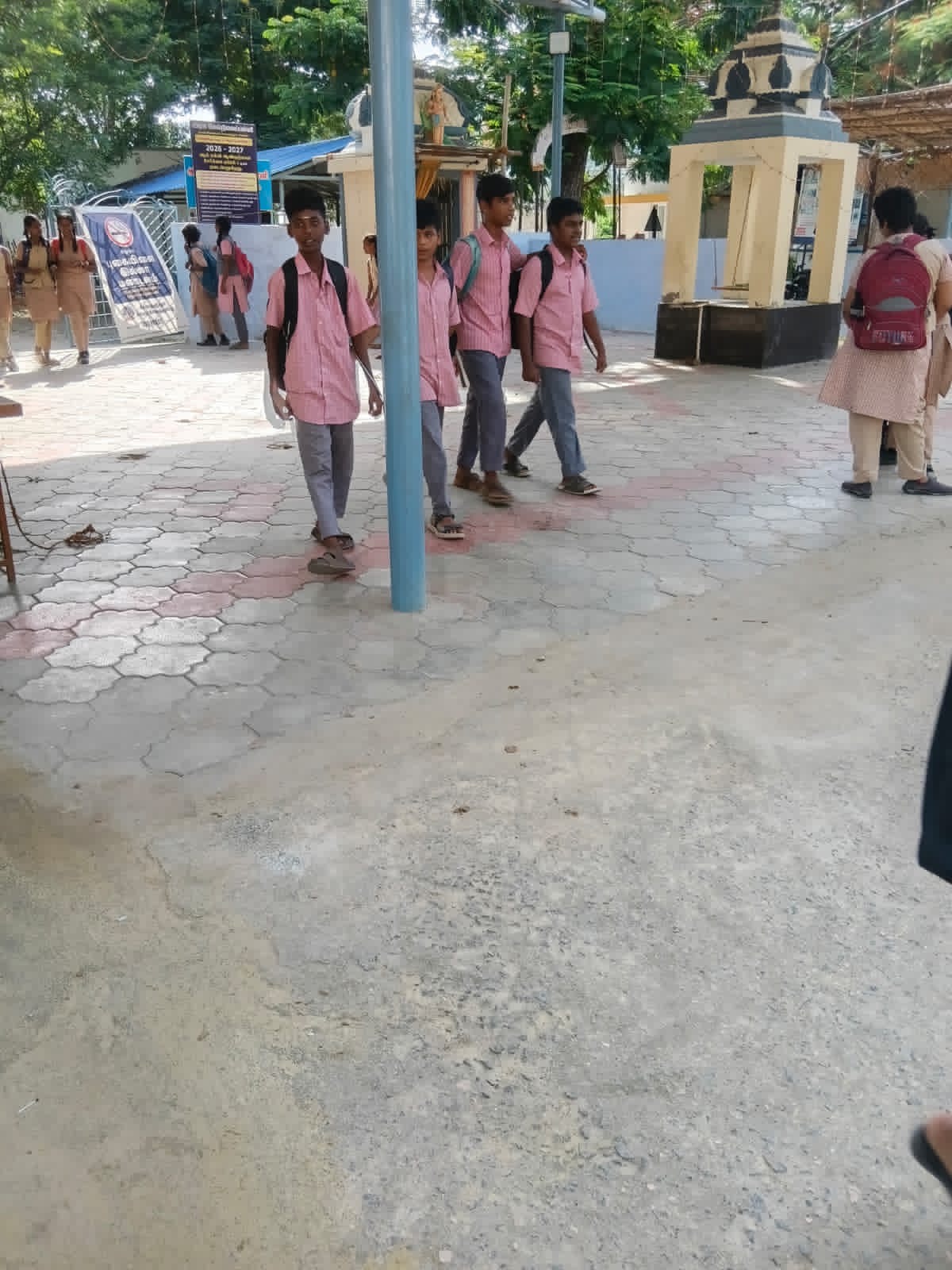 Students arriving at the Naickenpalayam government school entrance