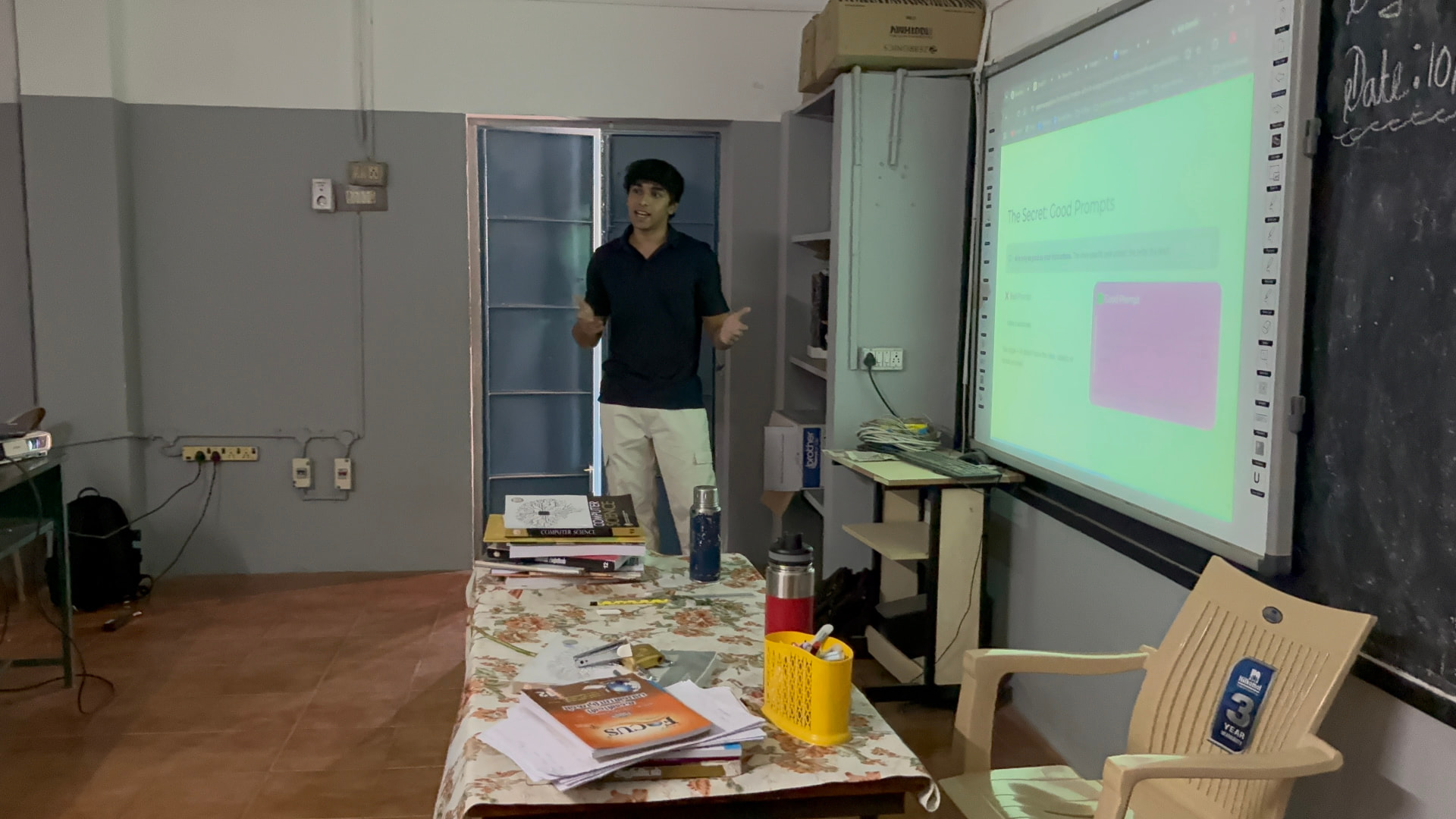 A volunteer-led smart board session at Naickenpalayam